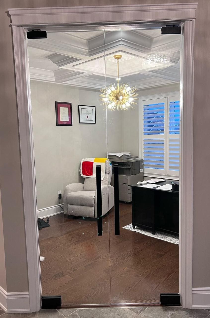 Frameless glass door to a home office