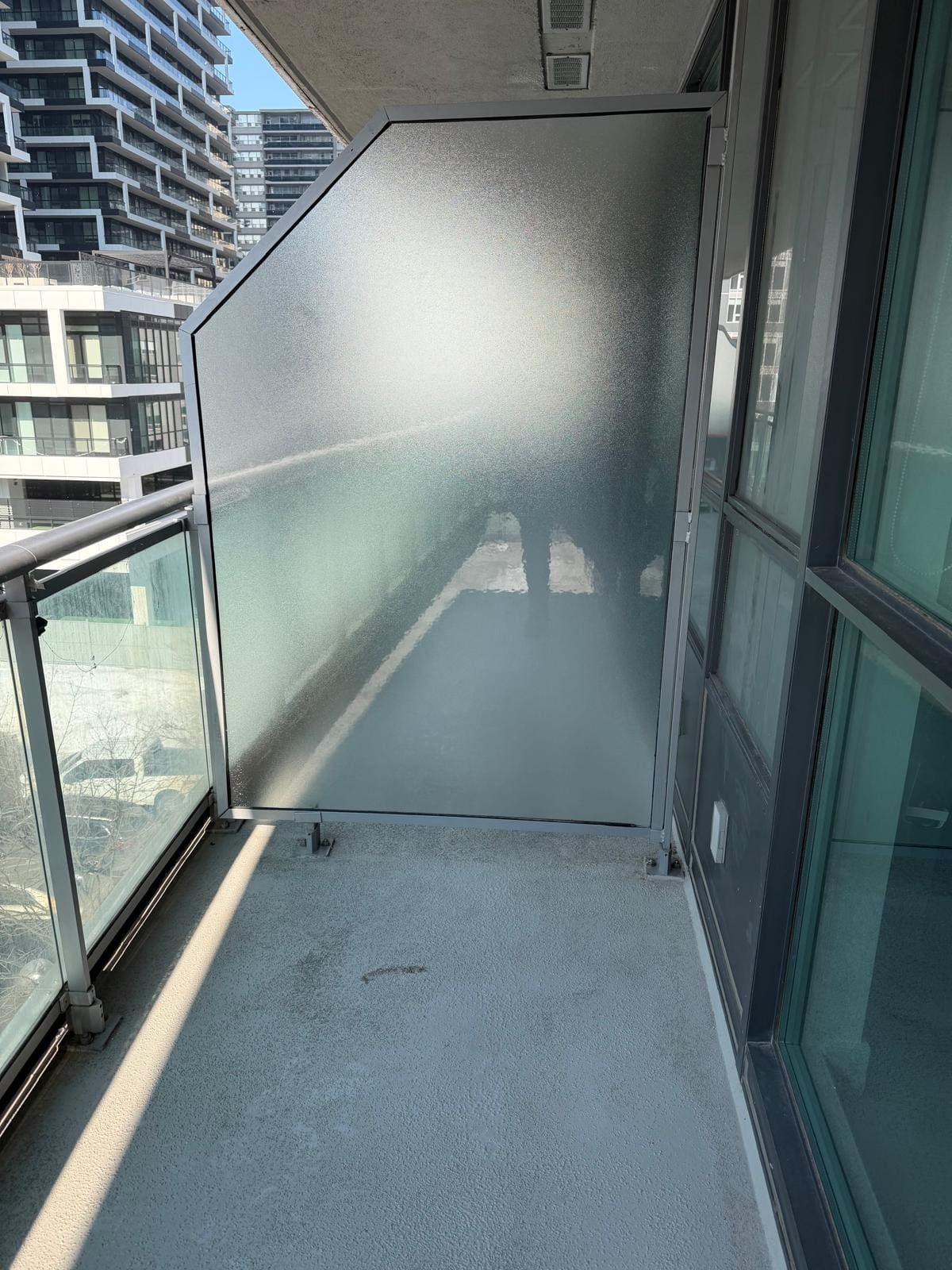 Condo balcony glass panel