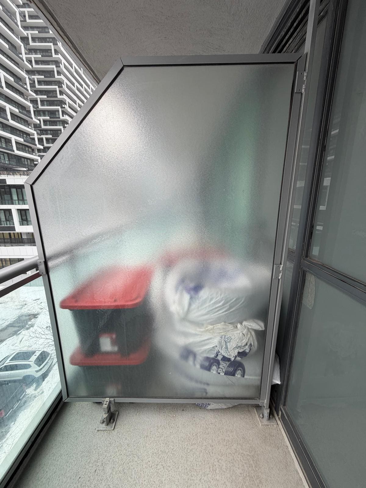 Condo balcony glass panel