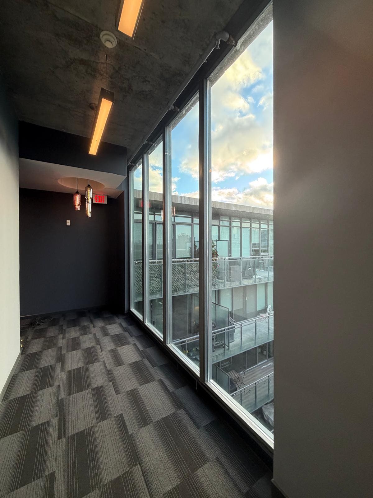 Glass along a commercial corridor window wall