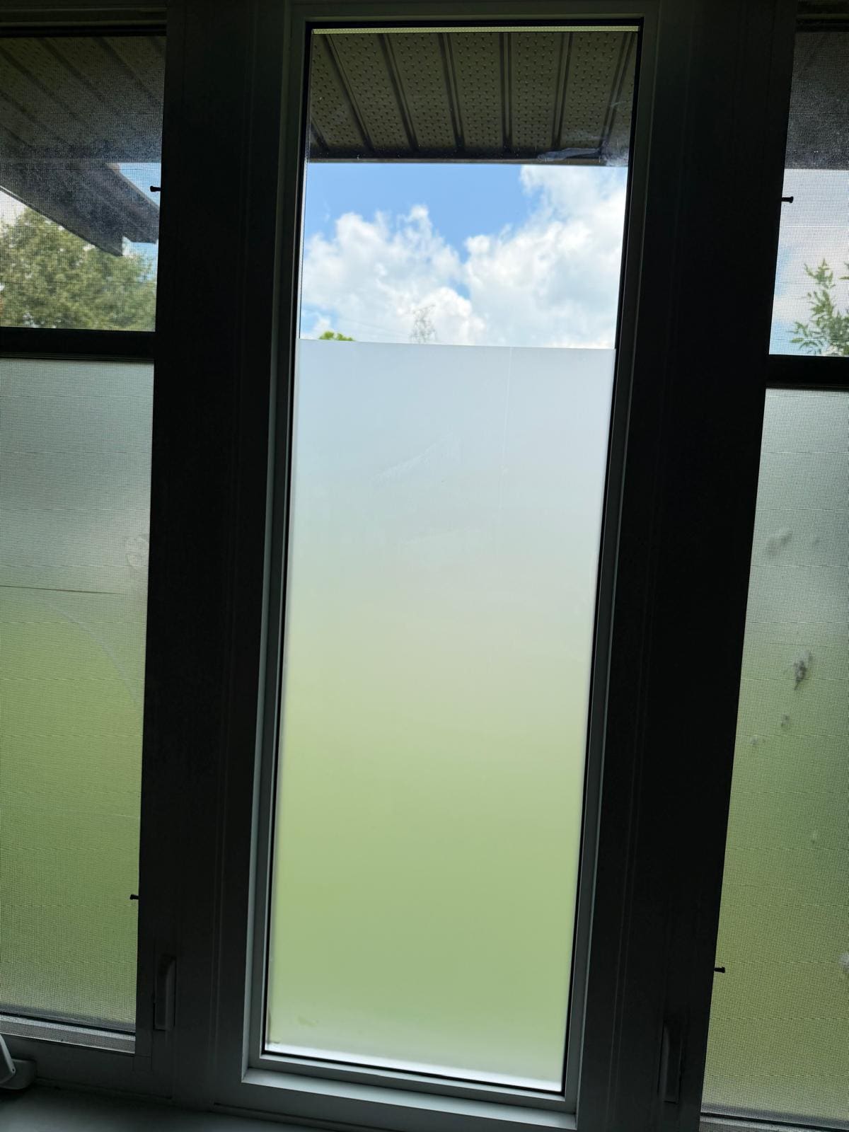 Frosted privacy glass in a window