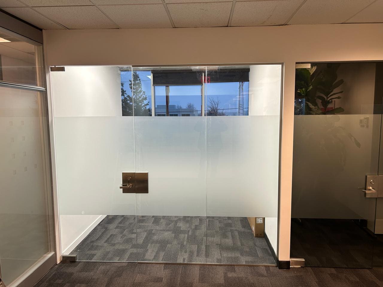 Glass offices with a frosted privacy band