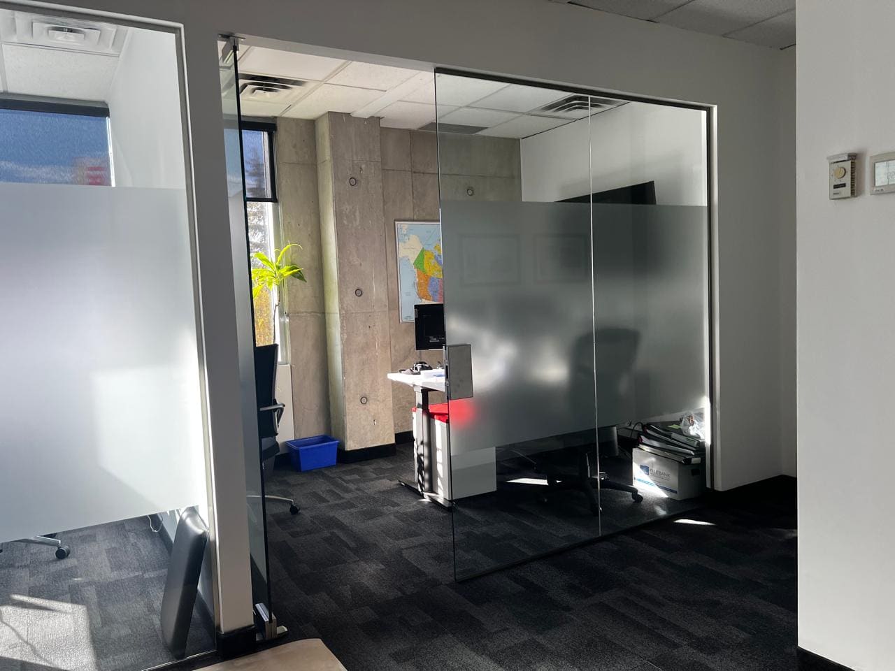 Glass offices with a frosted privacy band