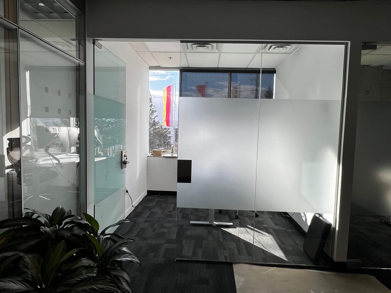 Glass offices with a frosted privacy band