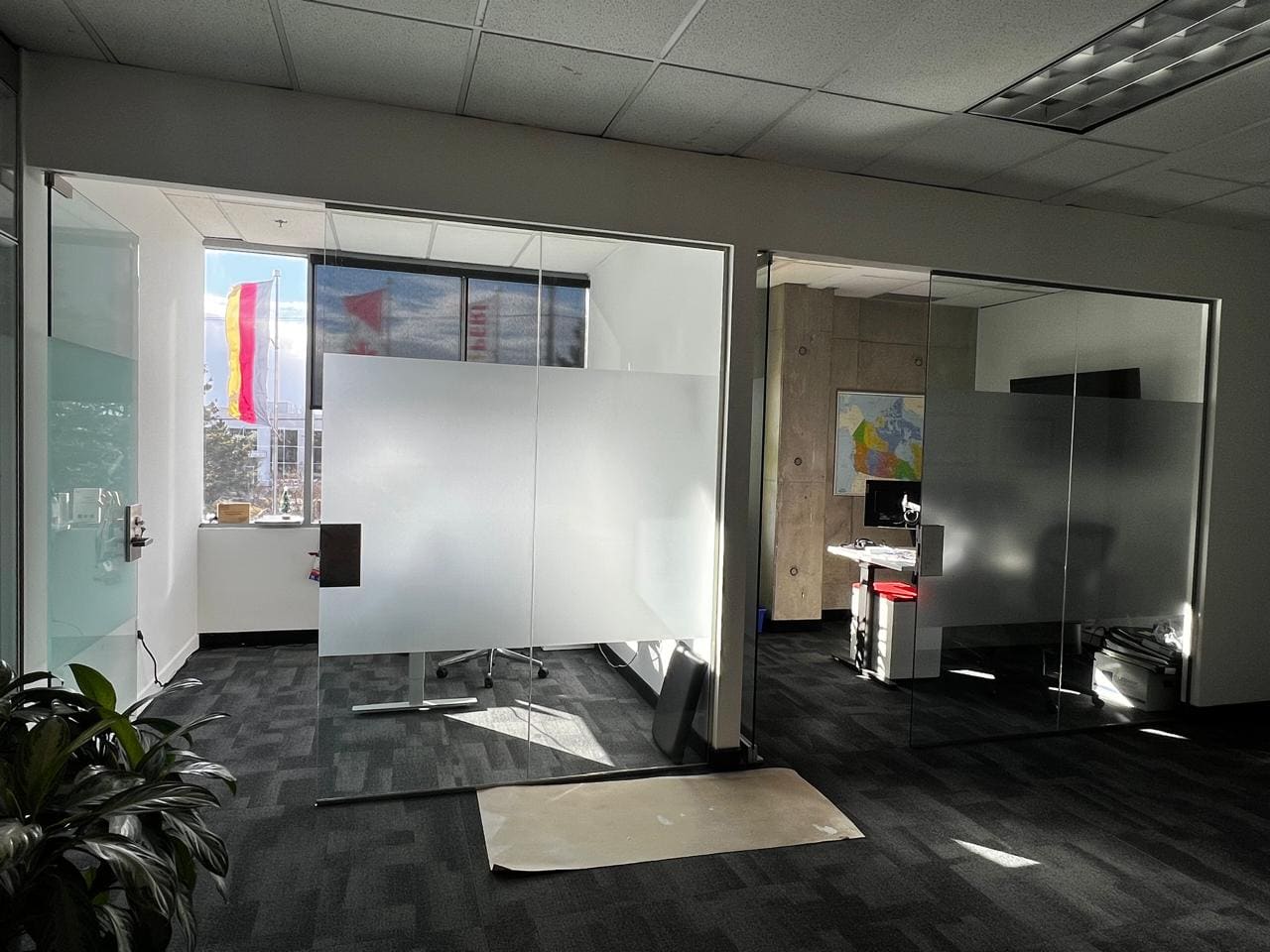 Glass offices with a frosted privacy band