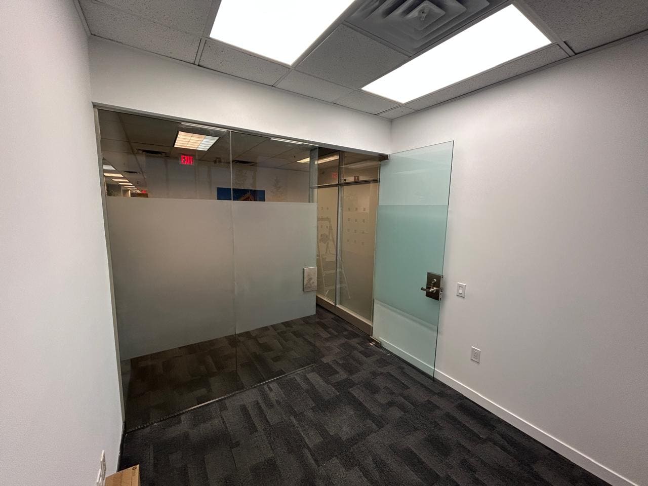 Glass offices with a frosted privacy band