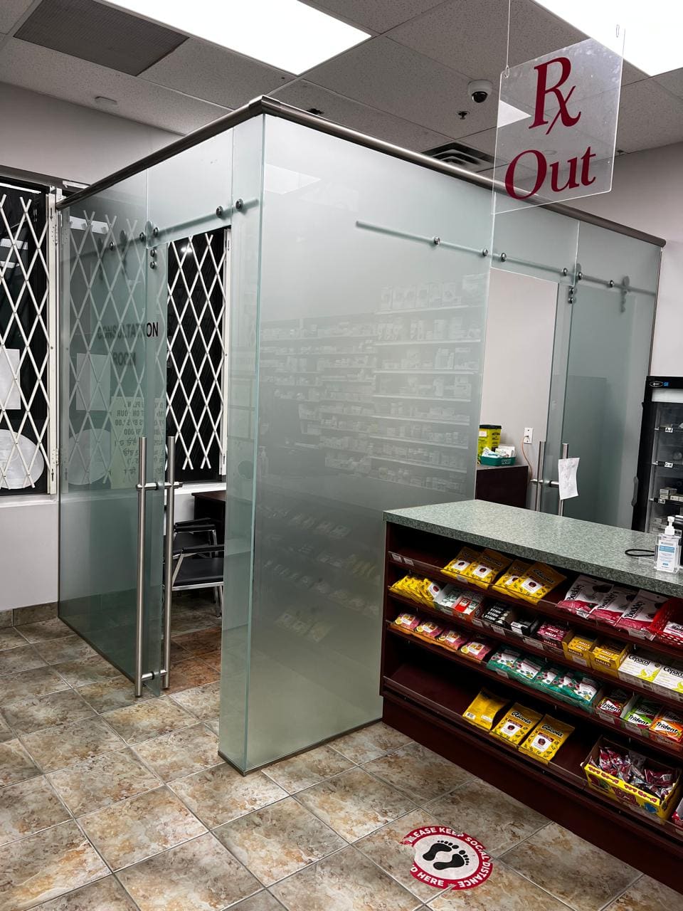 Glass enclosure inside a pharmacy