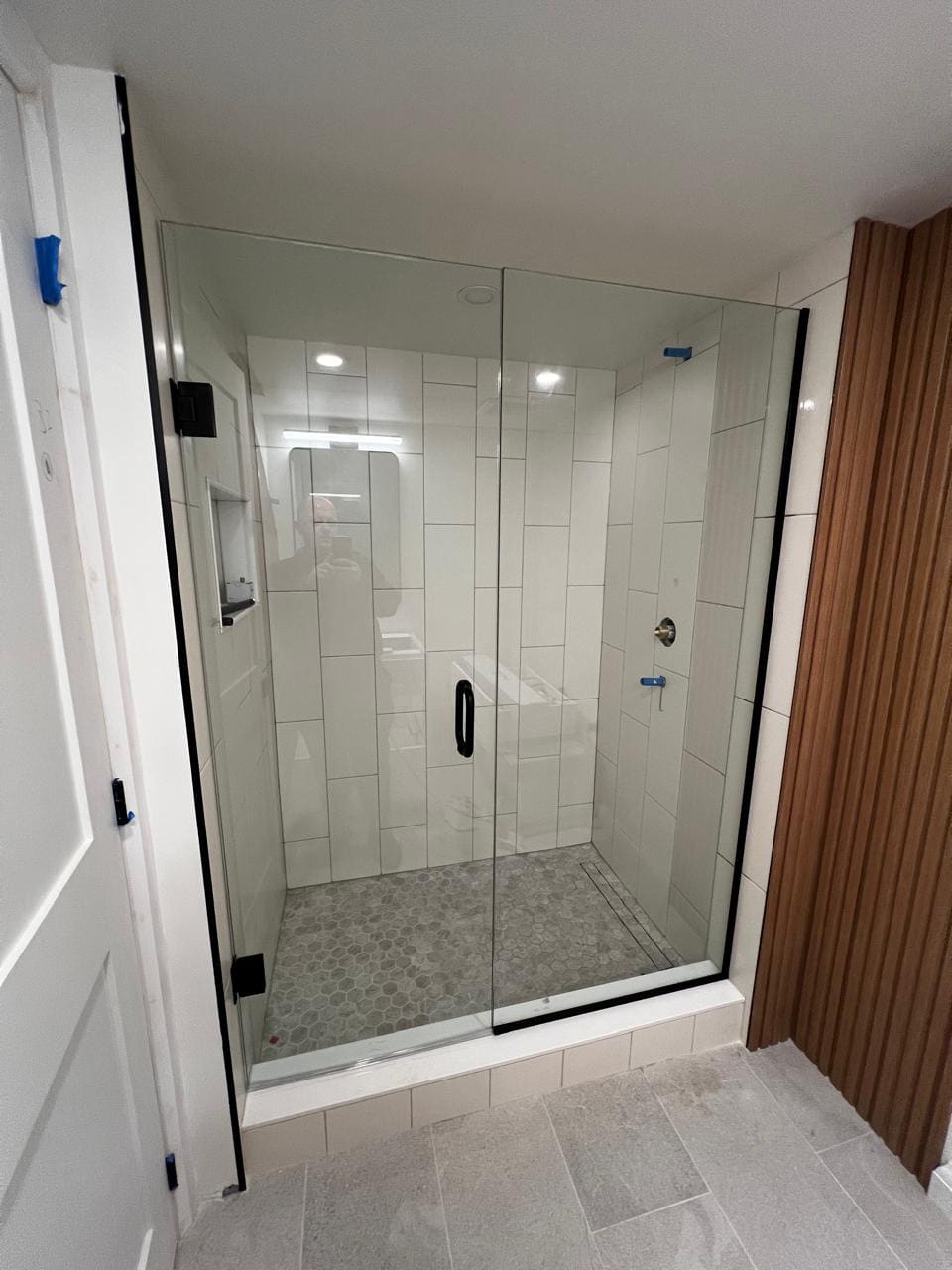 Glass shower enclosure