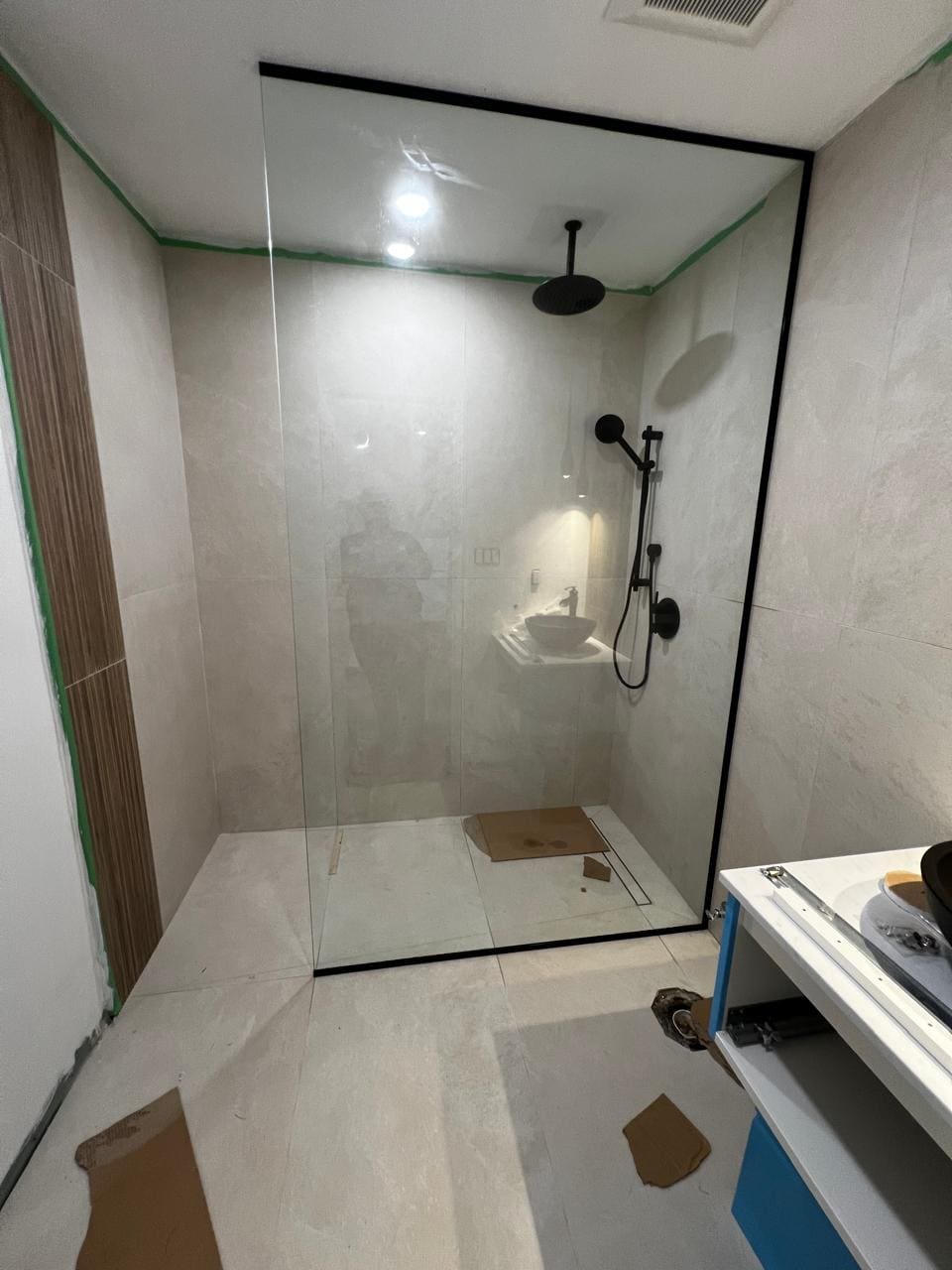 Glass shower enclosure