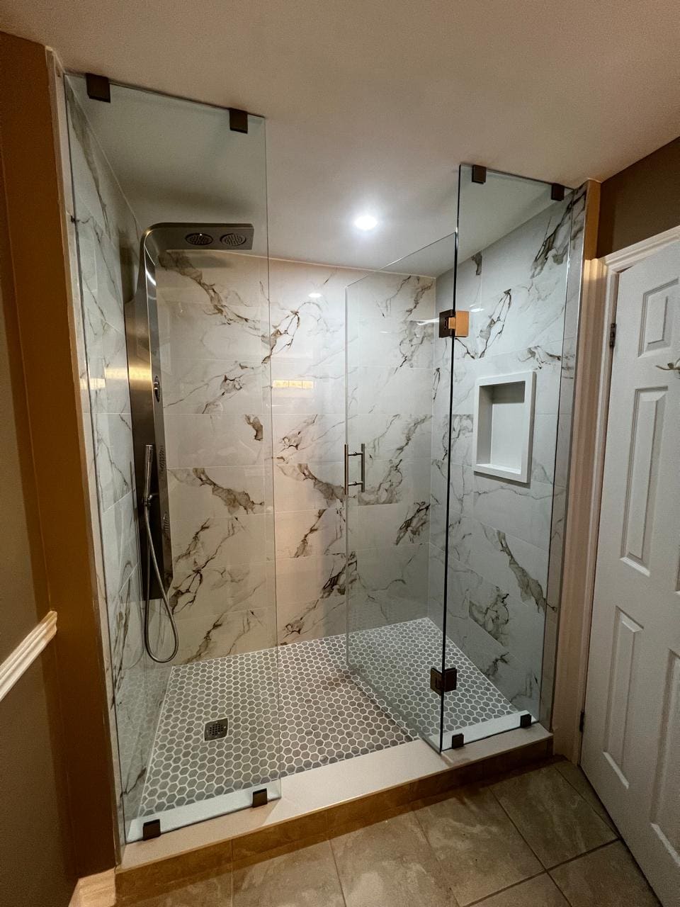 Glass shower enclosure