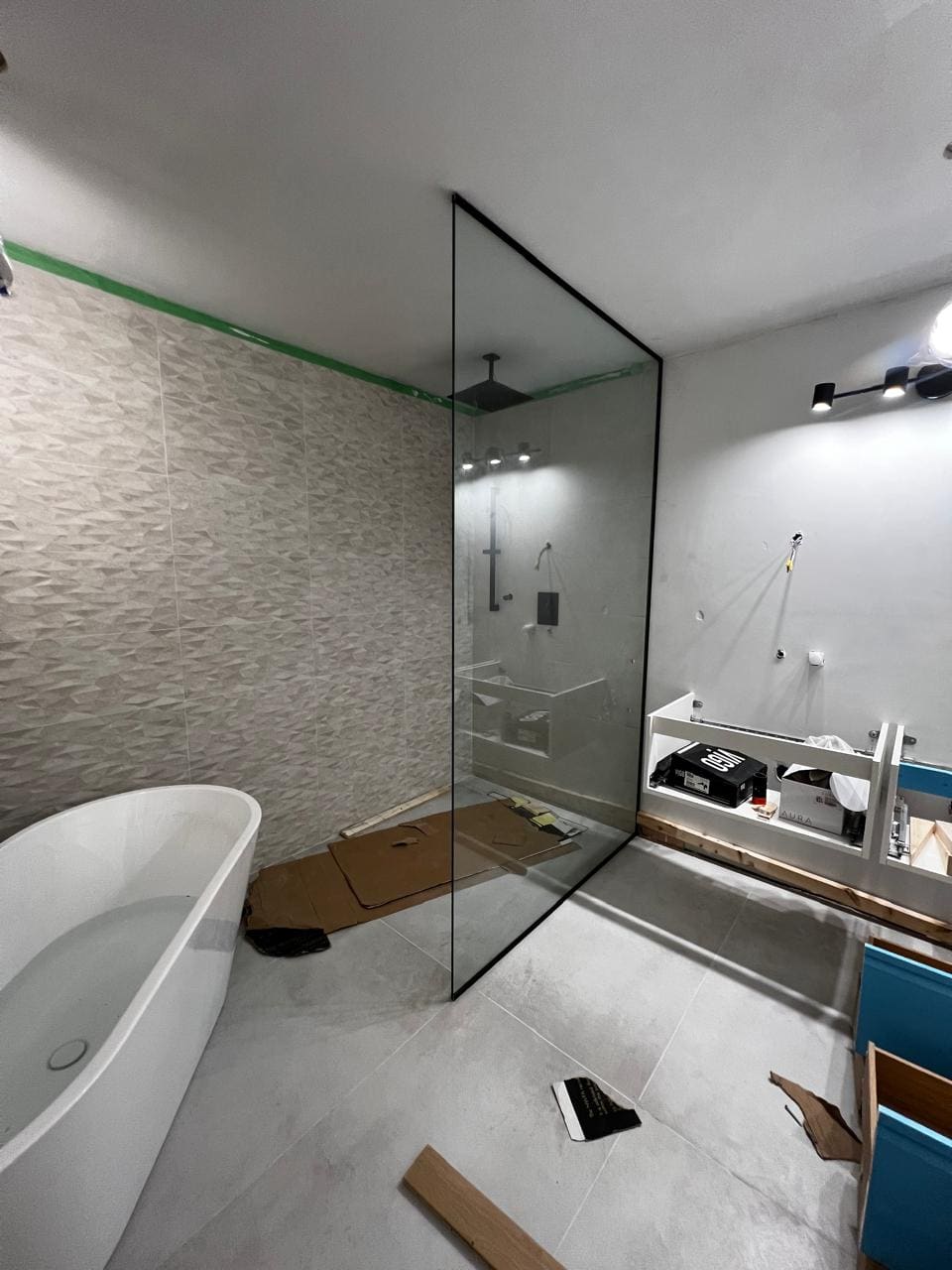 Glass shower enclosure